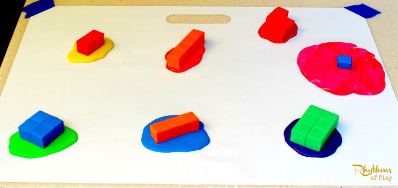 How to start painting with foam blocks (photograph by Nell Regan K. founder of Rhythms of Play.)