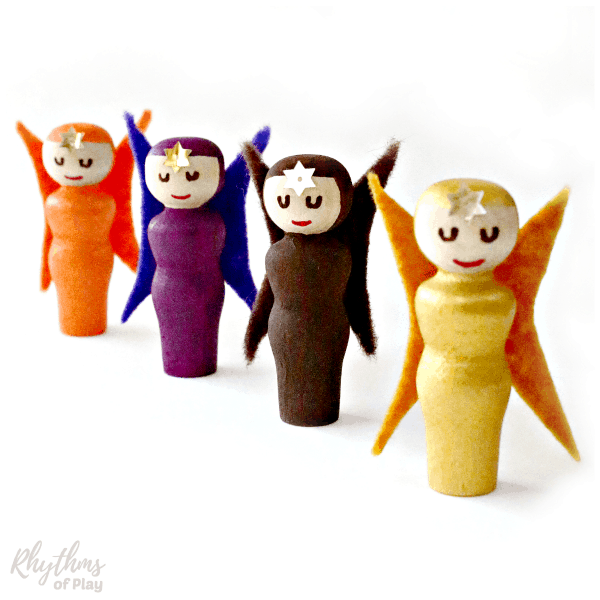 fairy craft for kids and adults made with wooden peg dolls, acrylic paint, and felt.