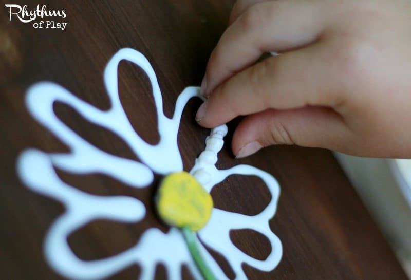 This shell flower nature craft is an excellent fine motor activity for kids. Once finished they make gorgeous home decor and are a great gift idea for Mother's Day, Christmas, and birthday's! DIY Project | Kids Craft | Kid-made Gift | Nature Art