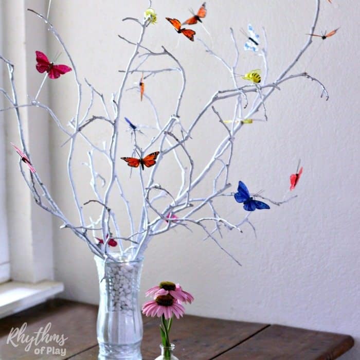 A DIY butterfly tree centerpiece is an easy craft that makes a lovely addition to your home decor or summer nature table.
