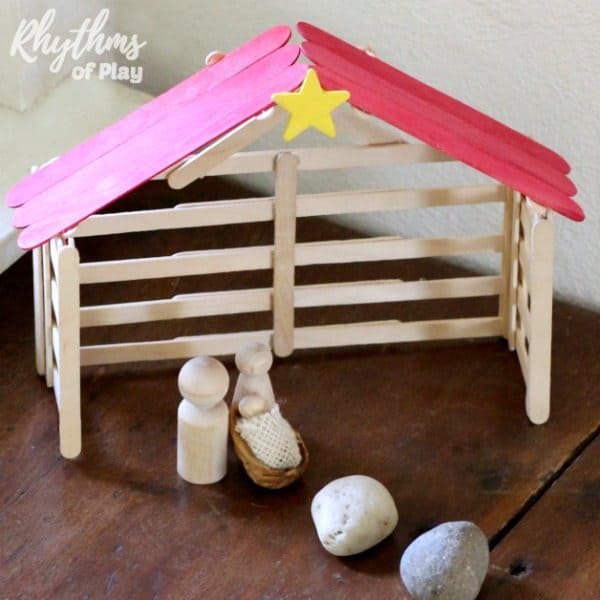 Kids and adults will both love making this DIY craft stick nativity stable. A fun DIY project the whole family can enjoy. It looks lovely displayed as Christmas home decor and makes a great gift idea for the holidays. Click through for the easy to follow tutorials and details of how we are using our handmade popsicle stick creche as an element in our advent calendar nativity scene. 