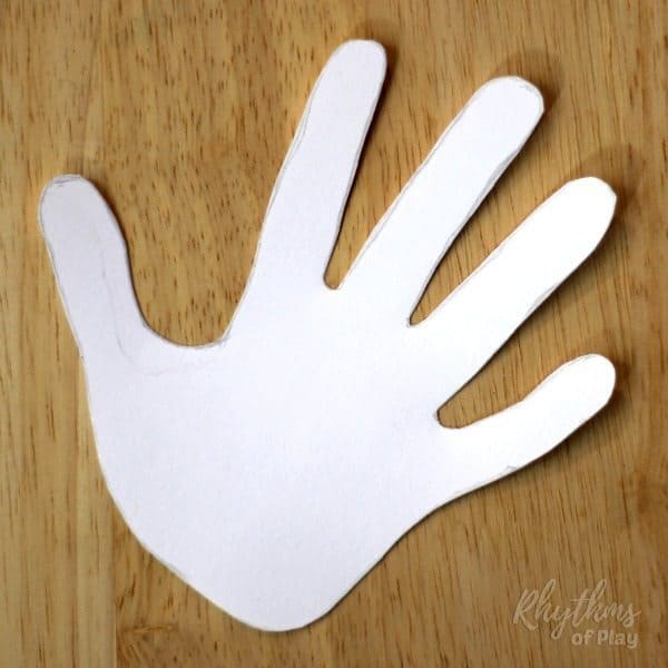 handprint art template for DIY marbled clay jewelry dish