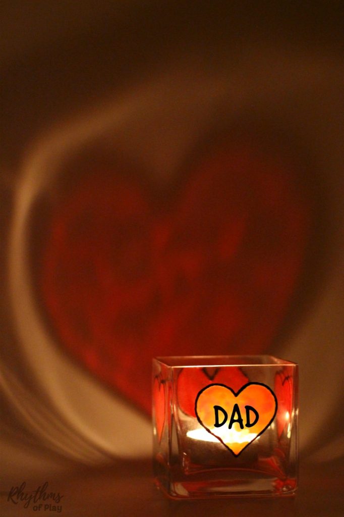 DIY Father's Day Gift Idea - Dads and grandpas love homemade personalized keepsake gifts for Father's Day! Creating gorgeous stained glass hearts on square votive candle holders and personalizing them for daddy or papa is fun and easy for both kids and adults. Anyone that can draw or trace can do this easy handmade craft project.