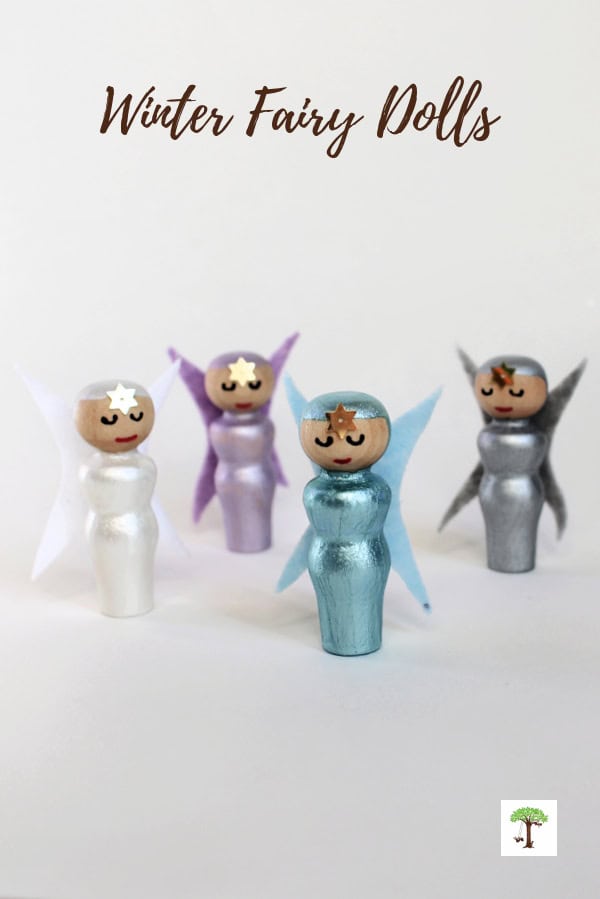 Fairy dolls made with wooden peg dolls, paint, and felt in frosty winter colors.