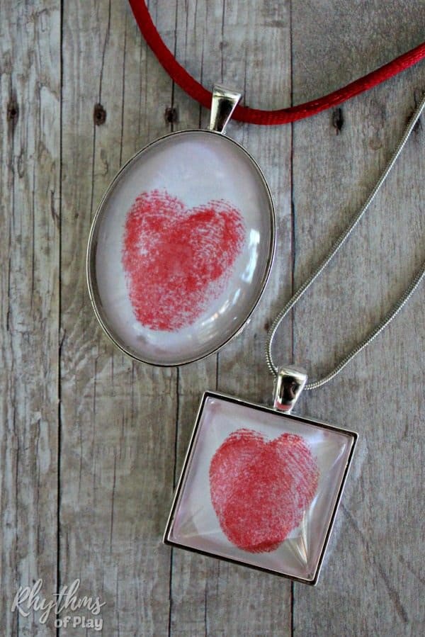 Square and oval thumbprint heart pendants (DIY thumbprint heart necklaces and photographs by Nell Regan K. and C. Kartychok co-founders of Rhythms of Play)