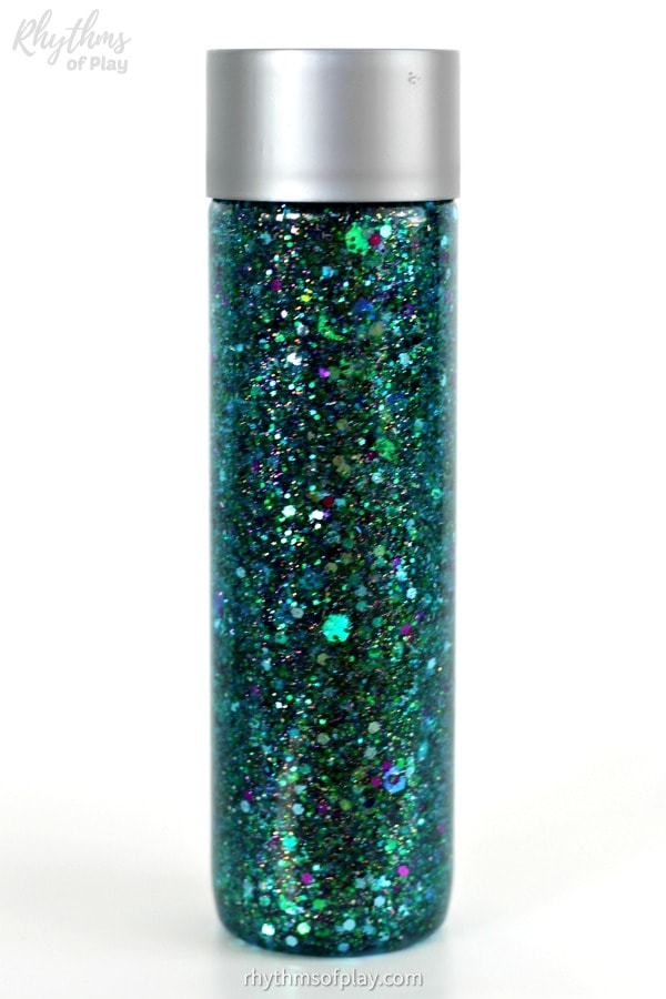 glitter sensory bottle diy that shines like a mermaid tail 