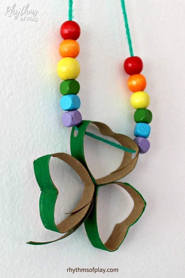 Saint Patrick's Day recycled toilet paper roll shamrock craft for kids (necklace and photo by Nell Regan Kartychok)