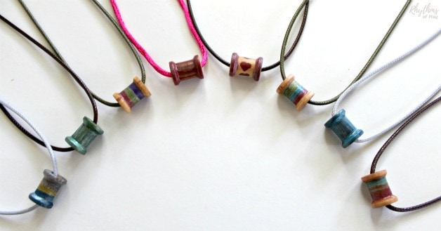 wooden spool necklaces with metallic brush pen painted wooden spools