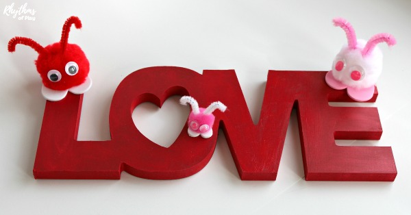 love bug sticker crafts stuck onto the word LOVE