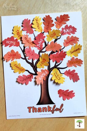 Here's the Thankful Tree printable with gratitude leaves glued to the Thanksgiving tree.