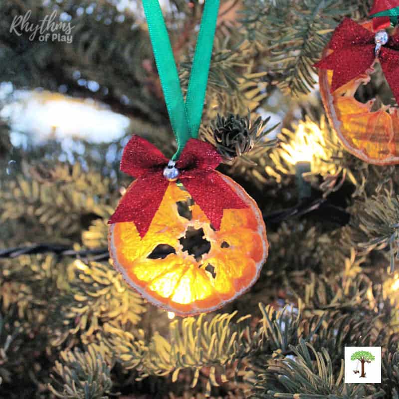 dried orange slice Christmas ornaments hanging on the Christmas tree