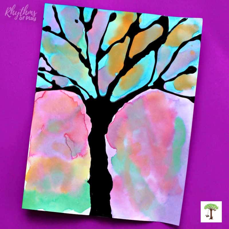 Paint this spooky bare tree silhouette in your favorite Halloween-themed colors (oranges, purples, or greens)