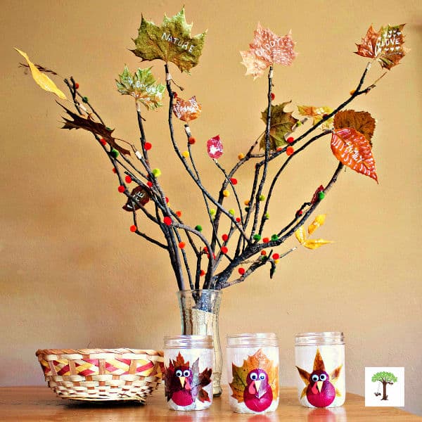 Thanksgiving thankful tree on a table with turkey leaf luminaries by Nell Regan Kartychok.