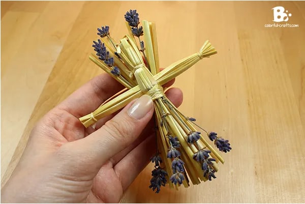 St Brigid doll craft made with straw and fresh blooming lavender.