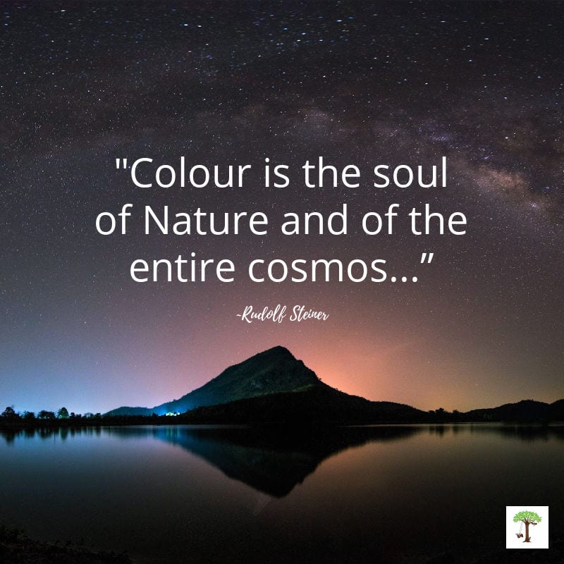Mountain near a lake at twilight with stars in the sky above and Rudolf Steiner quote, "Colour is the soul of Nature and of the entire cosmos..."