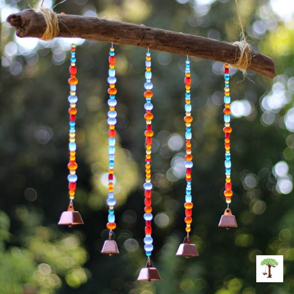 DIY sea glass wind chime with cowbells garden craft project with tutorial