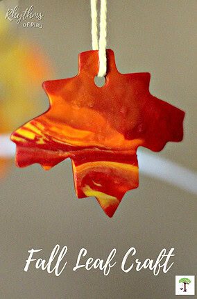 Fall leaf crafts: autumn leaves made with marbled red, yellow, and orange polymer clay.